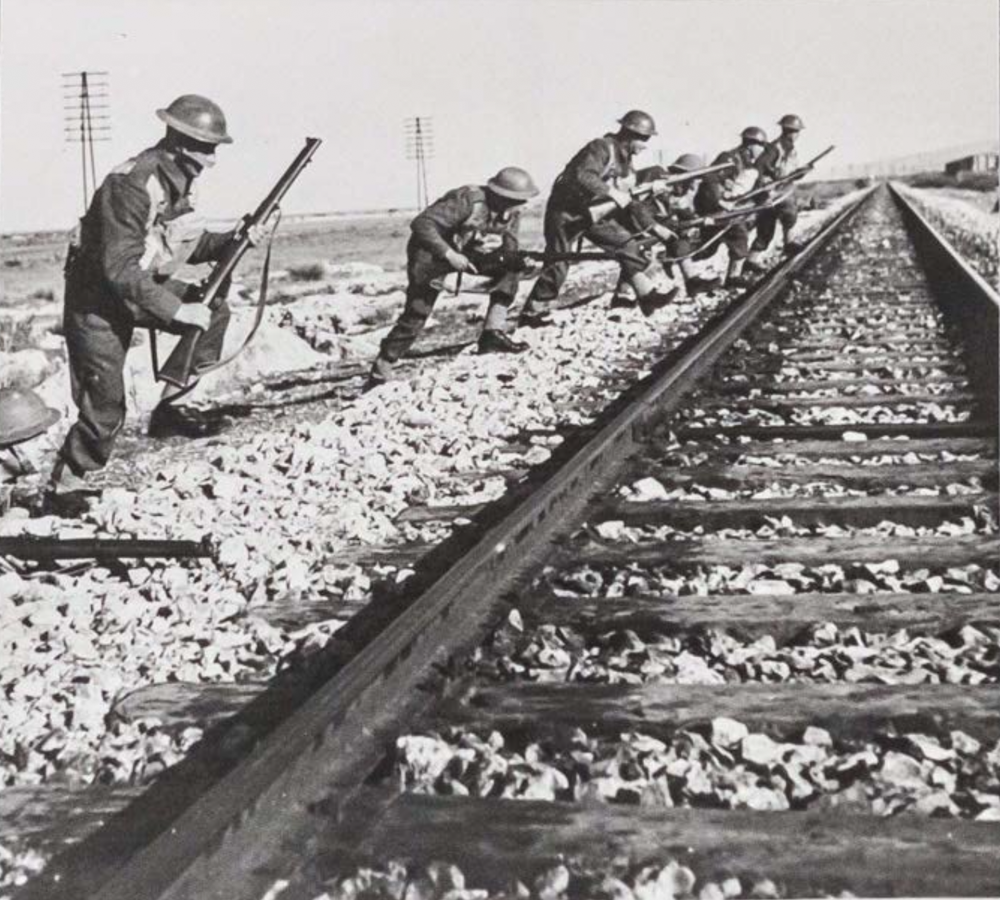 The photo shows the “Jewish Buffs” training along railway tracks in Cairo, Egypt.